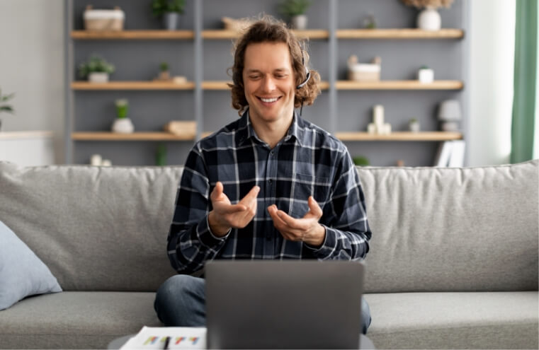 freelancer-man-using-laptop-making-video-call-sitt-2023-11-27-05-27-56-utc (1)