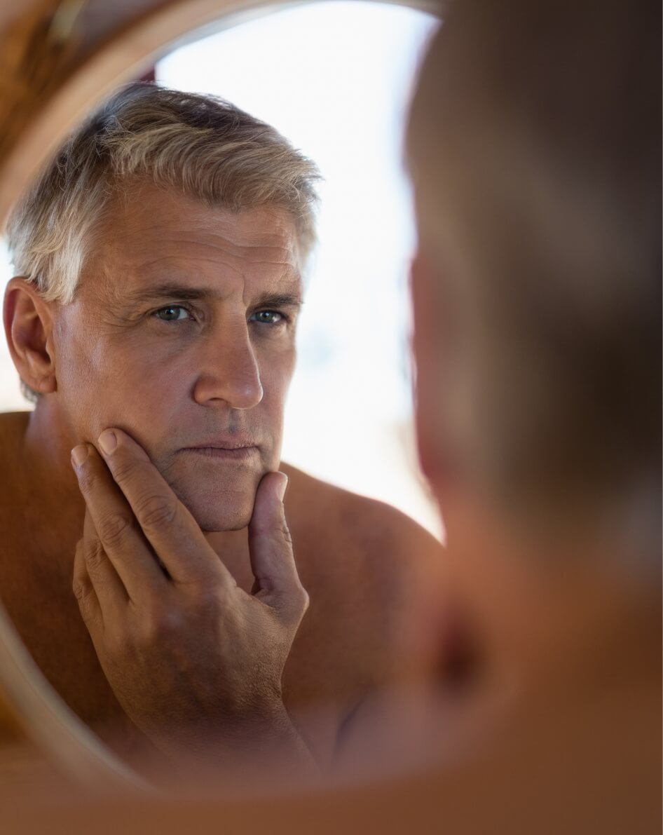 Man looking at mirror in cottage 2023 11 27 05 13 58 utc (1)